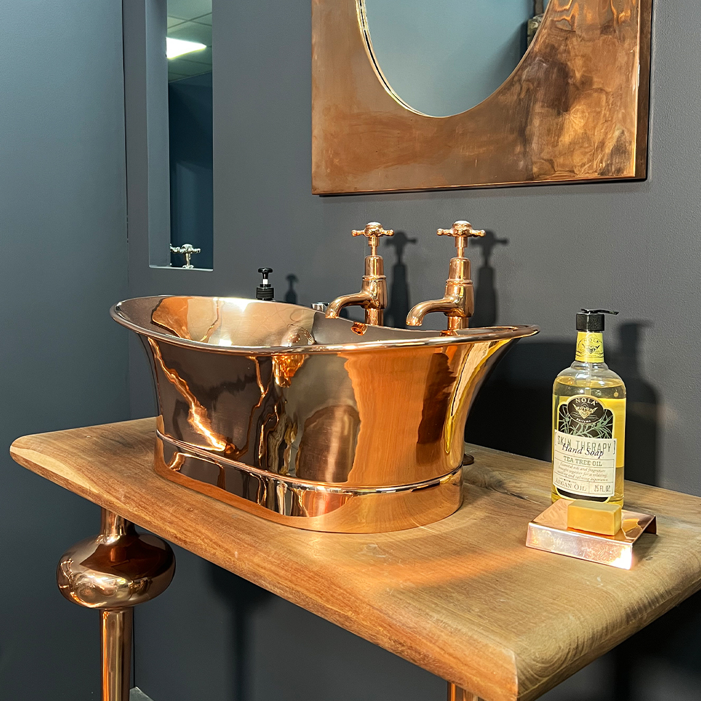 copper bateau basin with roll top range